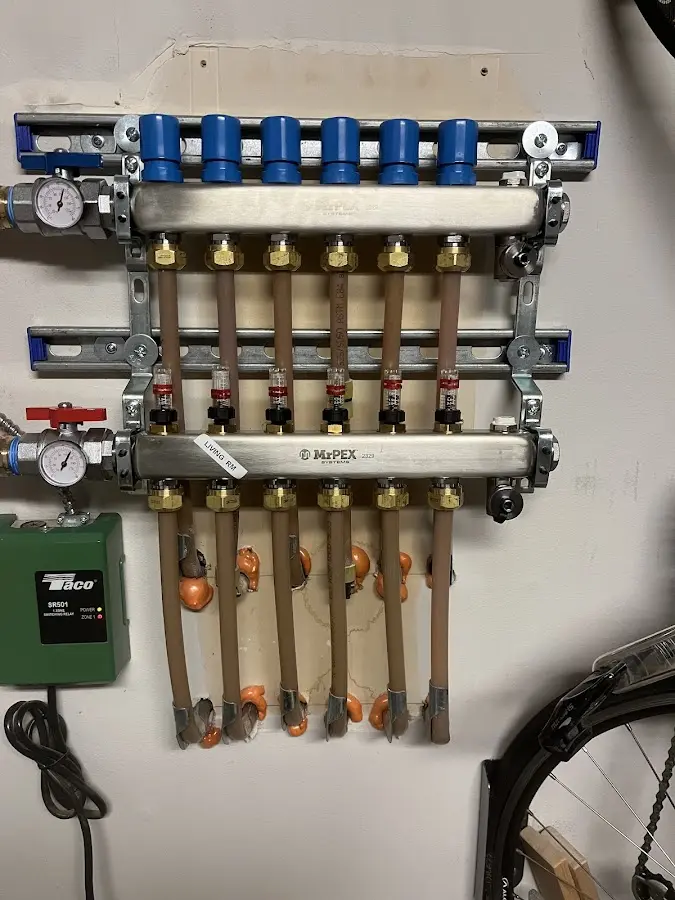 Plumber performing Leak Detection at a residential property in University Heights